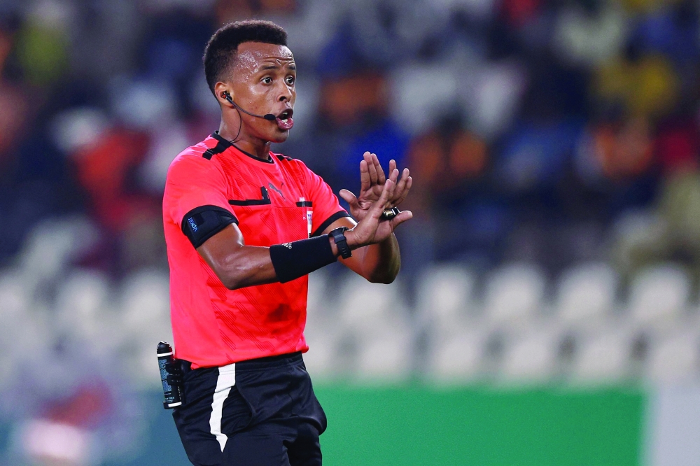 Somalian referee Omar Abdulkadir Artan gestures during the Africa Cup of Nations (CAN) 2024 group D football match between Mauritania and Algeria at Stade de la Paix in Bouake on January 23, 2024. — AFP