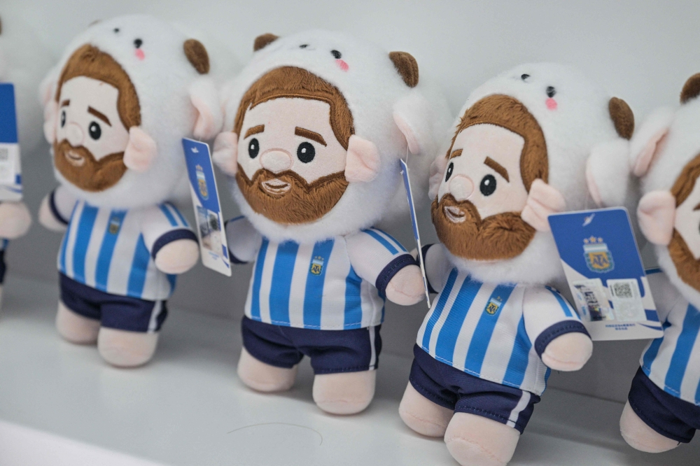 Merchandise for Lionel Messi of Argentina, which will participate in the FIFA World Cup 2026, at the All Star Partner factory in Yiwu in eastern China's Zhejiang province. 
