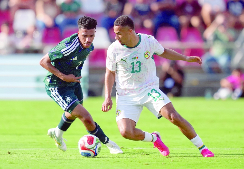 Saudi Arabia, Senegal end scoreless; Venezuela 
beat Iraq