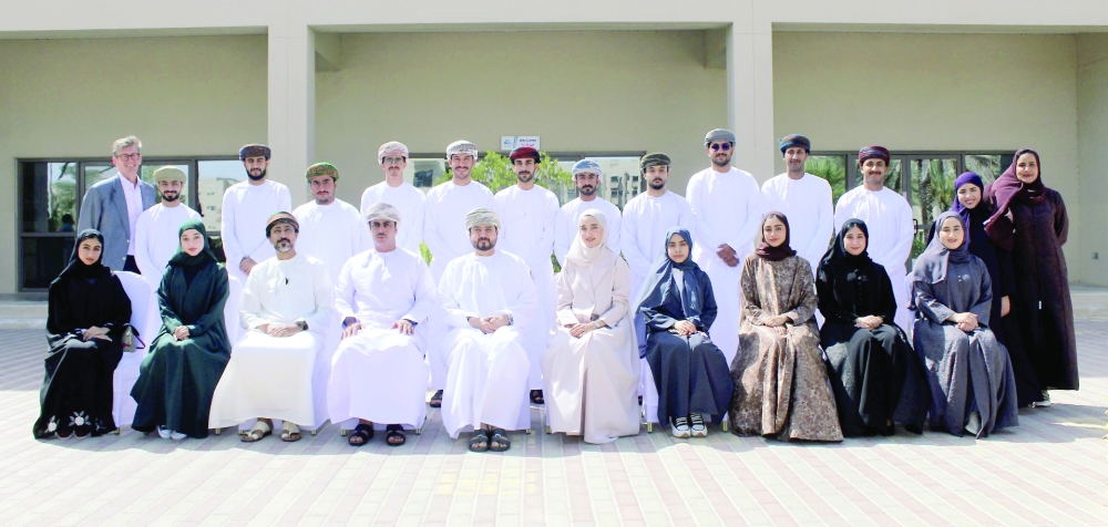 The 18 students pictured with the Chairman of OPAZ 