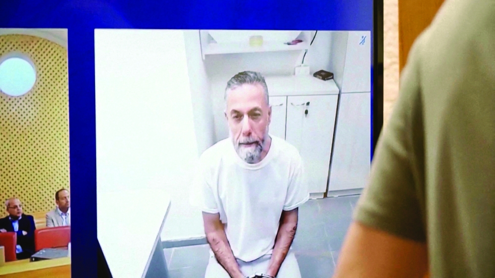 Palestinian doctor Hussam Abu Safiya, who was captured by the Israeli military in Gaza in late 2024, appears via video link at the Israeli Supreme Court hearing in Jerusalem. -  Reuters