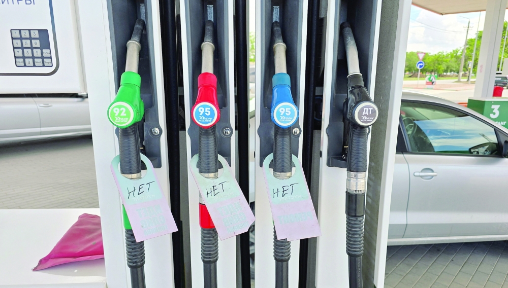 Signs reading 'No' placed on fuel pump nozzles at a gas station after local authorities restricted petrol sales and introduced rationing amid a supply shortage in the course of the Russia-Ukraine military conflict in the Black Sea resort city of Yevpatoriya, Crimea. — Reuters