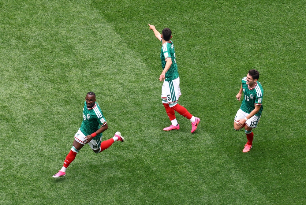 
Mexico's Julian Quinones celebrates scoring their first goal with Roberto Alvarado and Israel Reyes. — Reuters