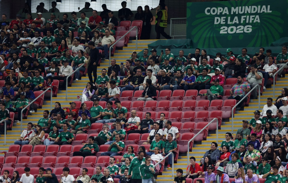  
Empty seats are seen in the stands during the match. — Reuters
