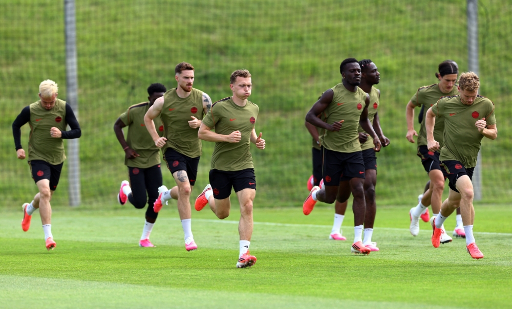  
General view of Canada's Alistair Johnston and teammates during training. — Reuters