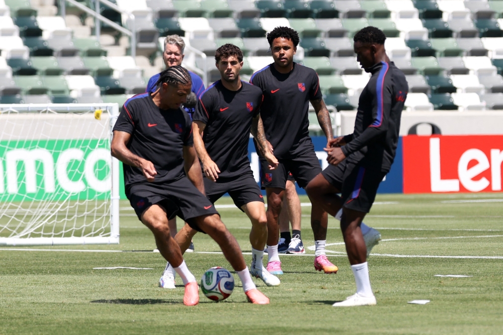  
Folarin Balogun, Miles Robinson, Christian Pulisic and Weston McKennie of the U.S. during training. — Reuters  