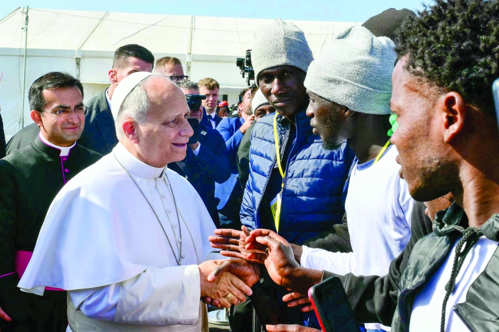Pope Leo XIV with migrants at the 'Las Raices' (The Roots) centre in San Cristobal de la Laguna