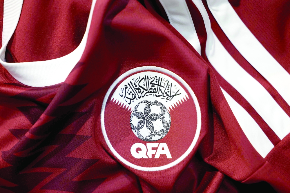 A jersey of Qatari national football team for the Fifa 2026 World Cup football tournament is displayed in Paris