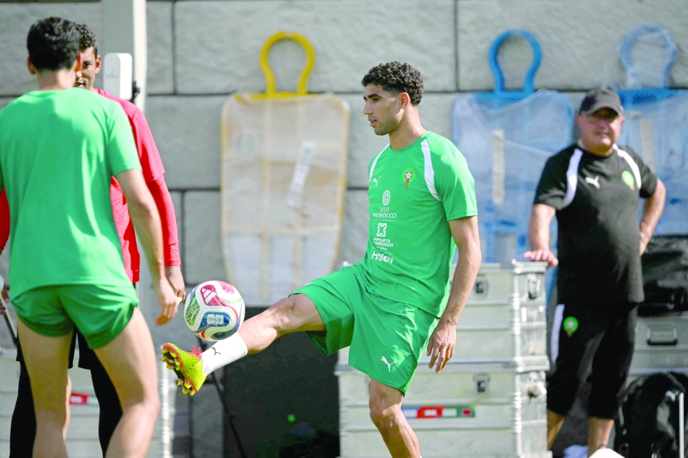 Morocco's defender Achraf Hakimi controls the ball during a training session for the 2026 World Cup football tournament 
