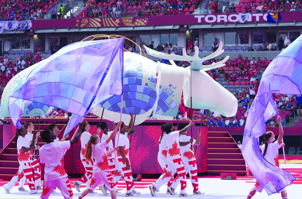 Performers during the show before the match. — Reuters
