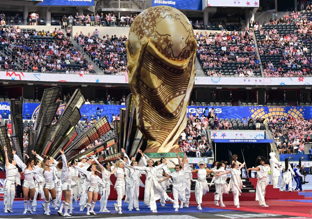 Artists perform during the opening ceremony ahead the match between USA and Paraguay at the Los Angeles Stadium. — AFP
