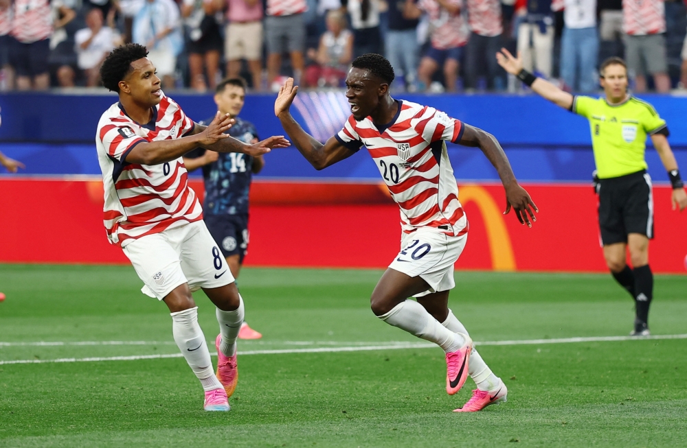 
Folarin Balogun of the U.S. celebrates scoring their second goal with Weston McKennie. — Reuters
