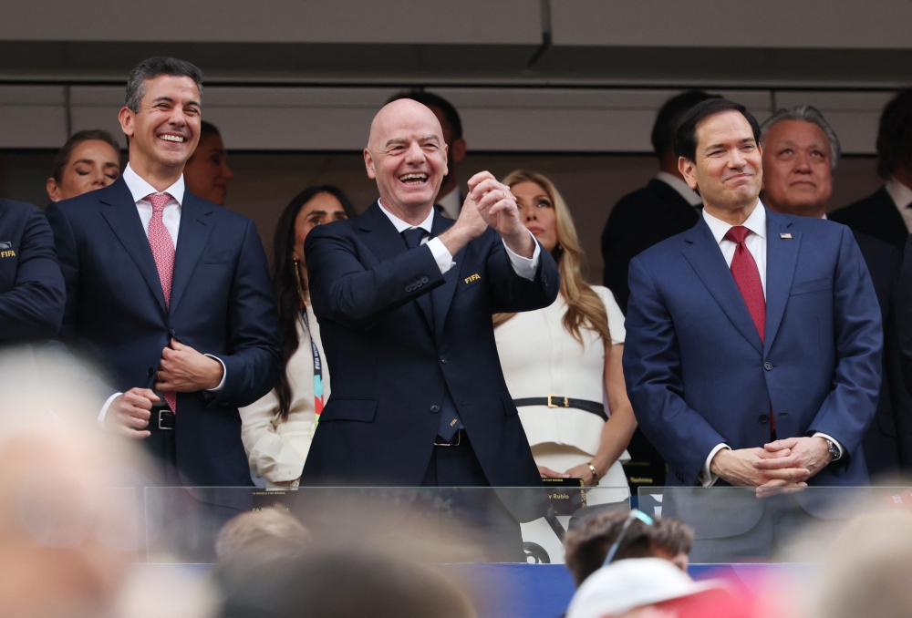 
President of Paraguay Santiago Pena, FIFA President Gianni Infantino and U.S. Secretary of State Marco Rubio react. — Reuters
