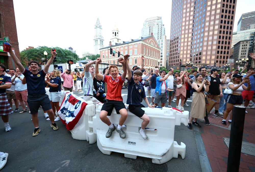 fans gather ahead of the match. —  Reuters