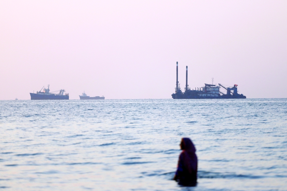 Vessels in the Strait of Hormuz near the beach of Bandar Abbas, Iran. — Reuters 