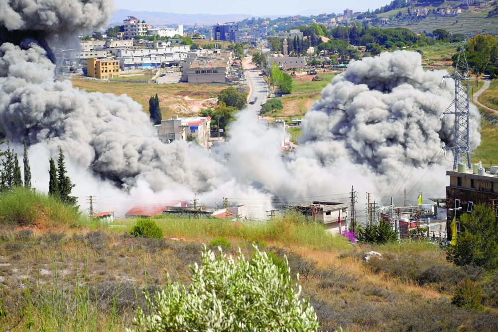 Smoke billows from southern Lebanon following an Israeli strike, as seen from Nabatieh, Lebanon. — Reuters