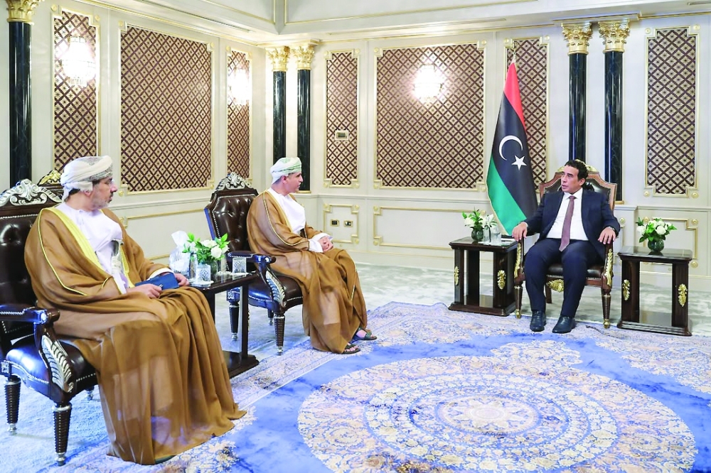 Mohamed al Menfi, President of the Presidential Council of the State of Libya, with Dr Hilal bin Abdullah al Sinani in Tripoli on Saturday.