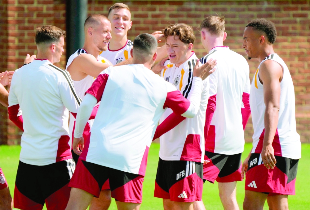 Germany's Angelo Stiller with teammates during training. — Reuters