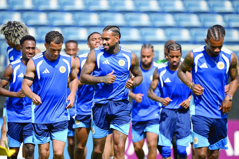 Curacao's players take part in a training session. — AFP