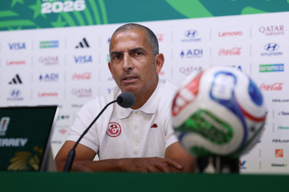 Tunisia's French head coach Sabri Lamouchi gives a press conference. —  AFP