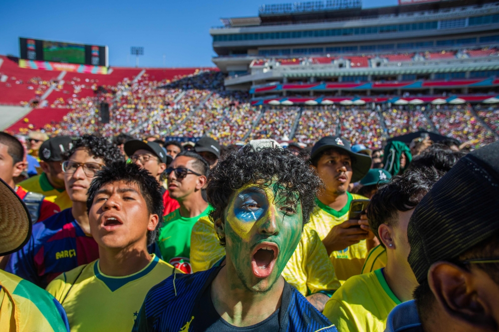 Brazil fans react during match between Brazil and Morocco at the FIFA Fan Festival. — AFP