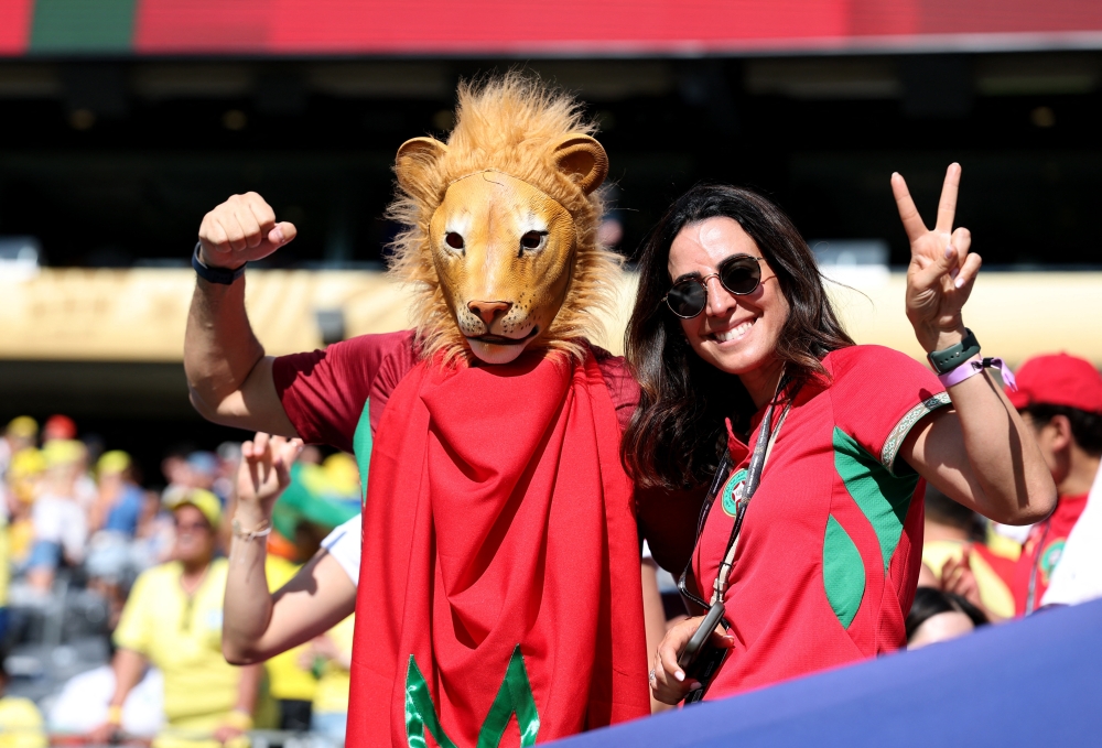 Morocco fans inside the stadium before the match. — Reuters