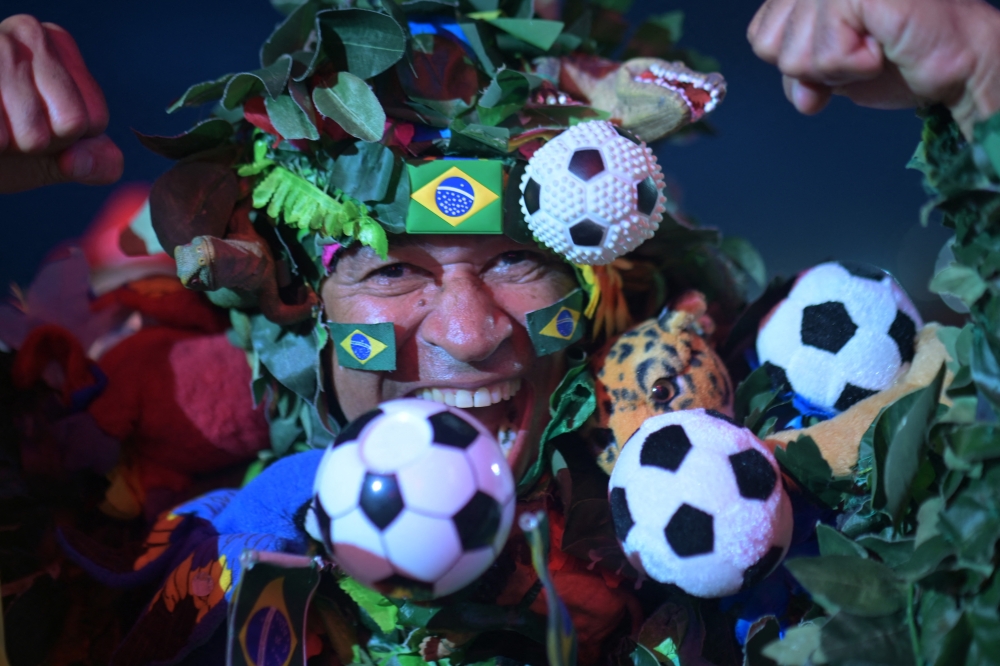A Brazil fan ahead of the match. — Reuters