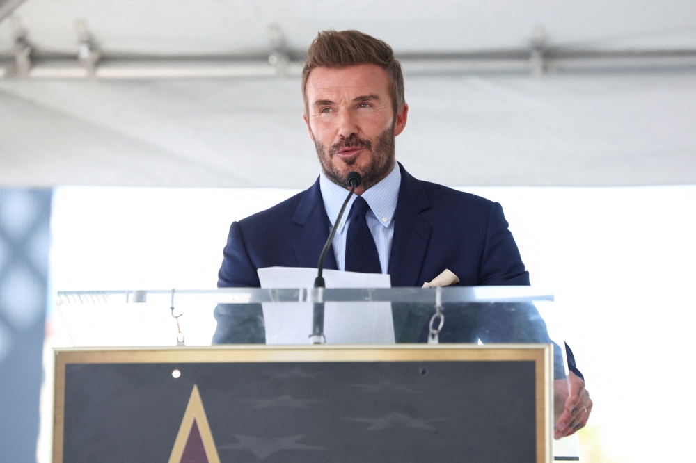 David Beckham speaks during his star unveiling ceremony on the Hollywood Walk of Fame, in Los Angeles, California, U.S. -Reuters 