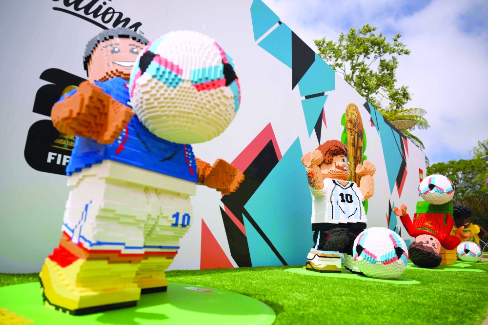 LEGO figures of France's forward #10 Kylian Mbappe, made of over 17,000 bricks, Argentina's forward #10 Lionel Messi, made of over 17,000 bricks, Portugal's forward #7 Cristiano Ronaldo, made of over 30,000 bricks, and Brazil's forward #07 Vinicius Junior, made of over 18,000 bricks, are displayed during the Fifa World Cup 2026 Experience for fans at LEGOLAND California in Carlsbad, California on June 13, 2026. (Photo by Patrick T. Fallon / AFP)
