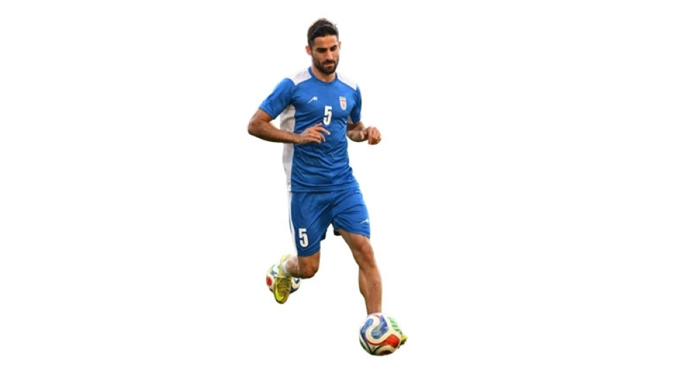 Iran's forward #18 Amirhossein Hosseinzadeh and defender #05 Milad Mohammadi take part in a training session at Carson Sports Park in Carson, California on June 14, 2026, on the eve of the 2026 World Cup football match between Iran and New Zealand.  (Photo by Patrick T. Fallon / AFP)