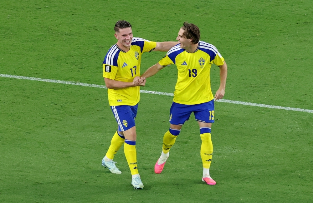  
Sweden's Mattias celebrates scoring their fourth goal with Viktor. — Reuters  