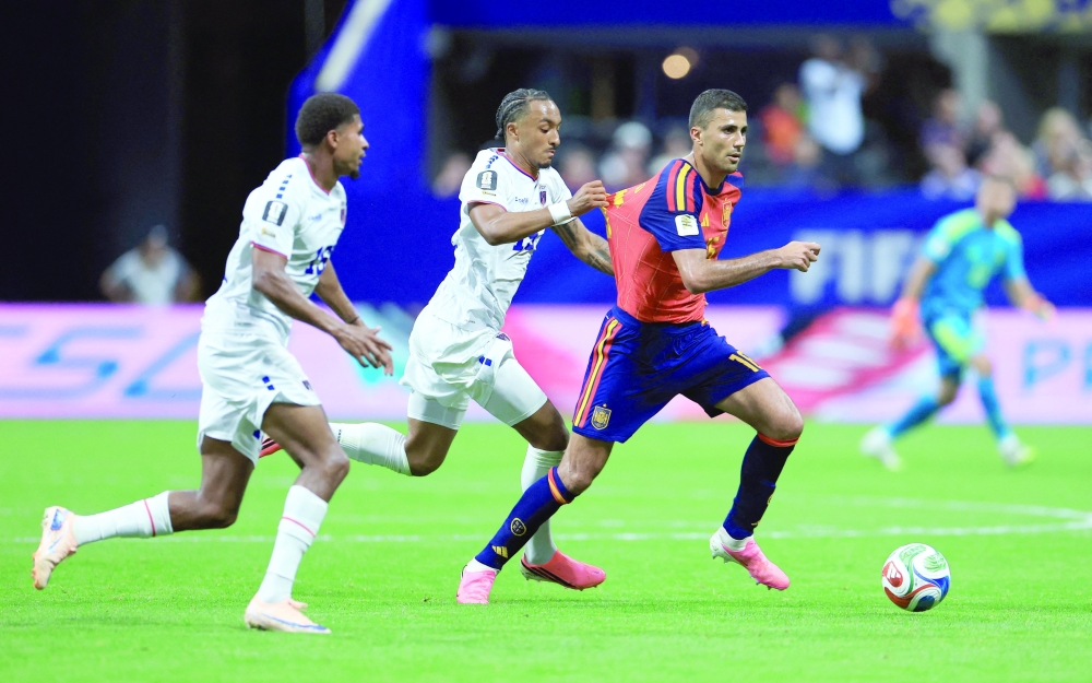 Spain's Rodri in action with Cape Verde's Dailon Livramento and Laros Duarte. — REUTERS