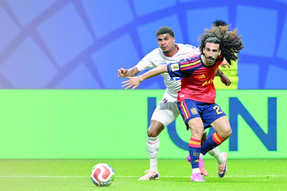Marc Cucurella fight for the ball during the 2026 World Cup Group H football match between Spain and Cape Verde. — AFP