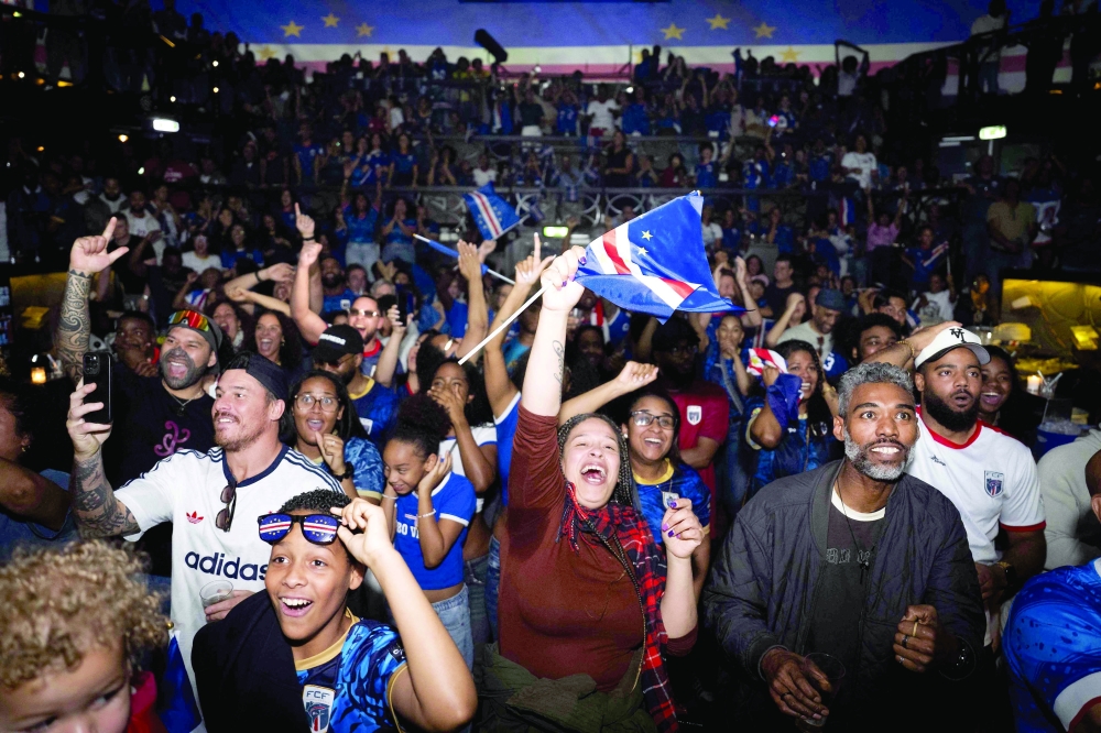 Cape Verde supporters watch the live broadcast of the 2026 FIFA World Cup footbal match between Spain and Cape Verde in Rotterdam. — AFP