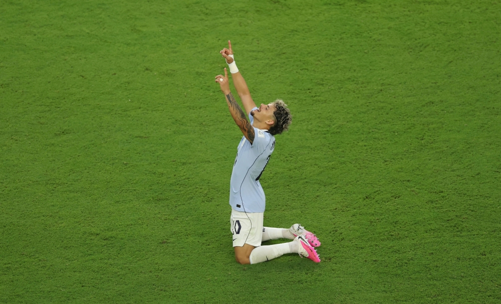  
Uruguay's Maxi Araujo celebrates scoring their first goal 