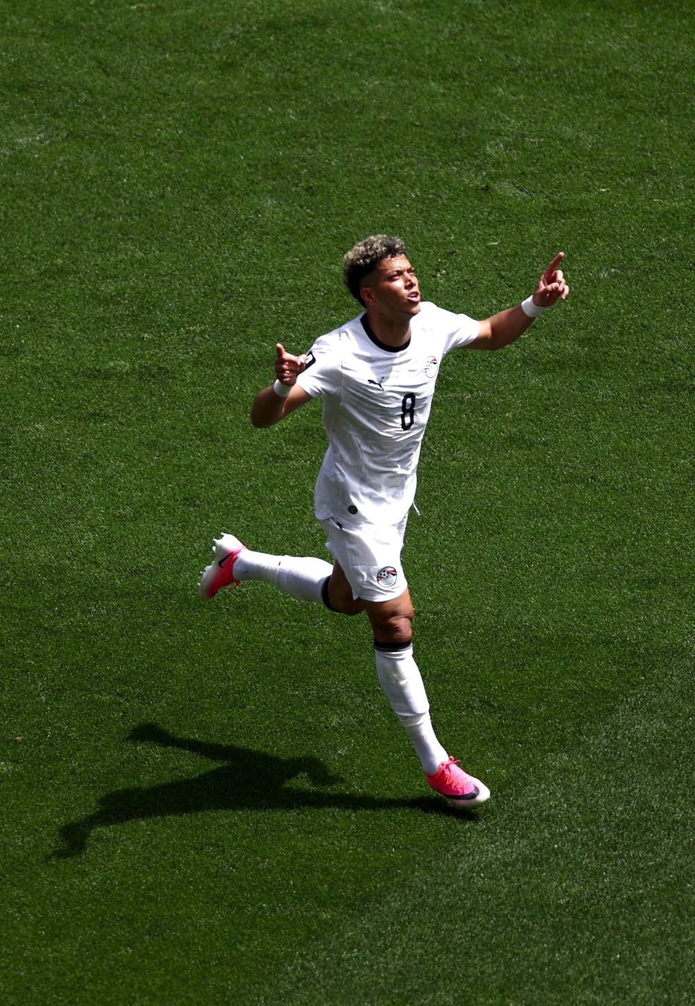  
Egypt's Emam Ashour celebrates scoring their first goal. — Reuters