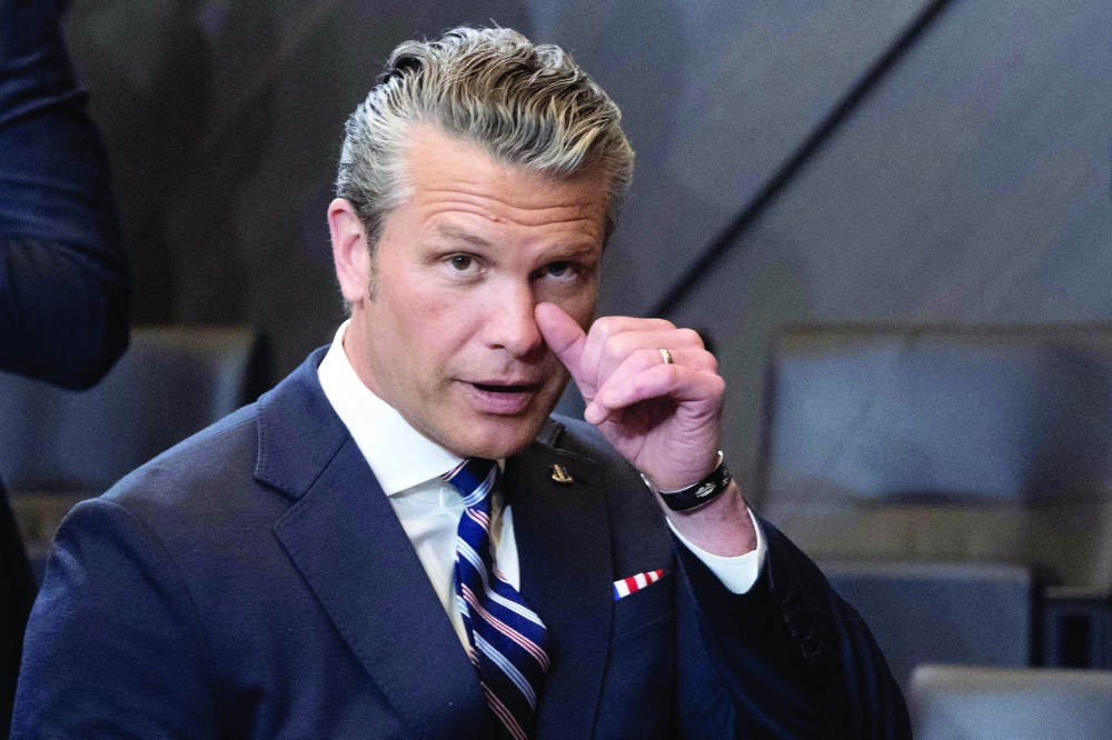 US Defence Secretary Pete Hegseth arrives to attend a Nato Defence Ministers meeting, in Brussels. — AFP
