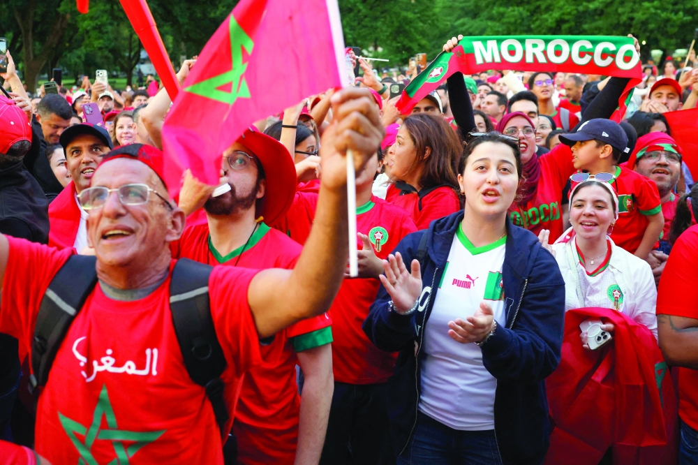 Morocco fans reacts as they gather on the Boston Common ahead of their game against Scotland
