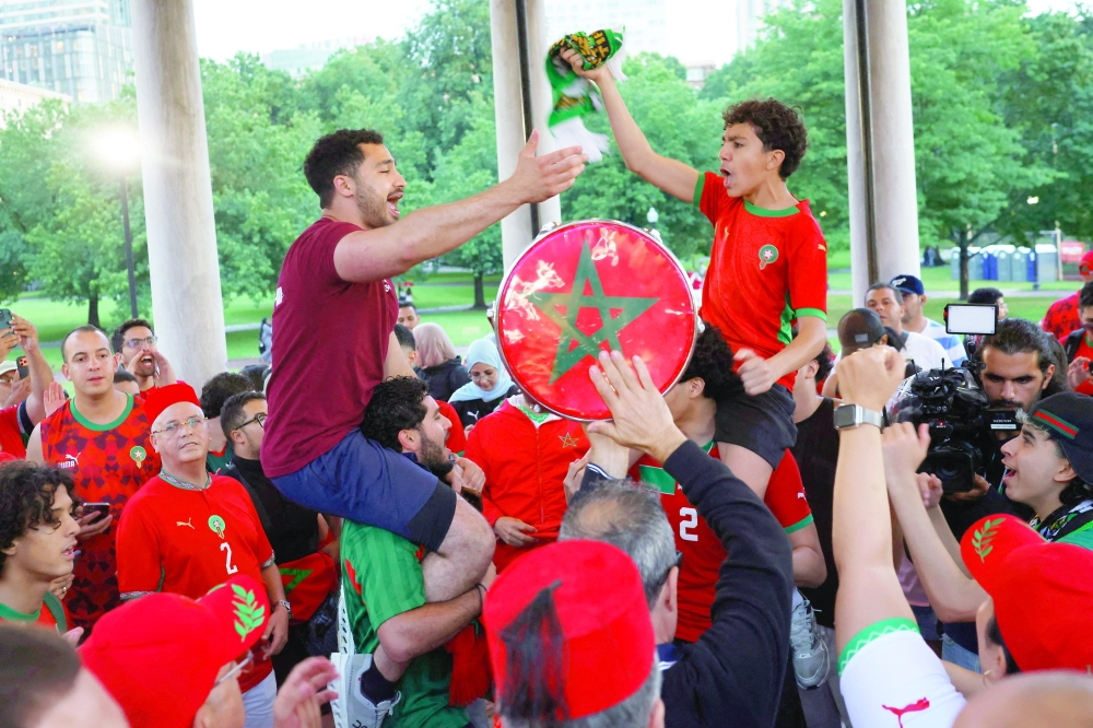 Morocco fans reacts as they gather on the Boston Common ahead of their game against Scotland