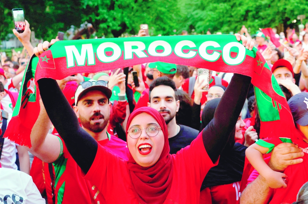 Morocco fans reacts as they gather on the Boston Common ahead of their game against Scotland