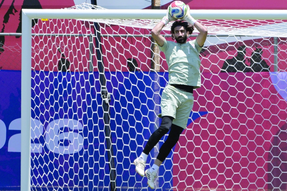 Iran's goalkeeper Alireza Beiranvand takes part in a training session ahead of Iran's FIFA World Cup 2026 Group G football match against Belgium
