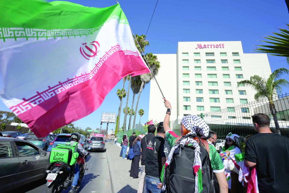 Iran fans wait for the team at the Marriott Hotel in Tijuana, Mexico