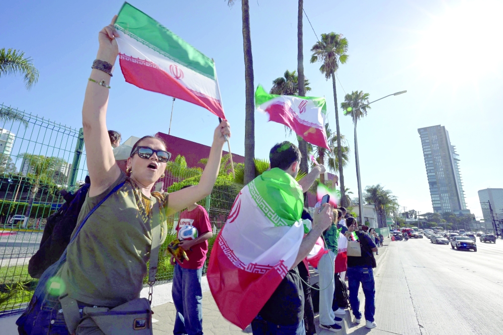 Iran fans wait for the team at the Marriott Hotel in Tijuana, Mexico