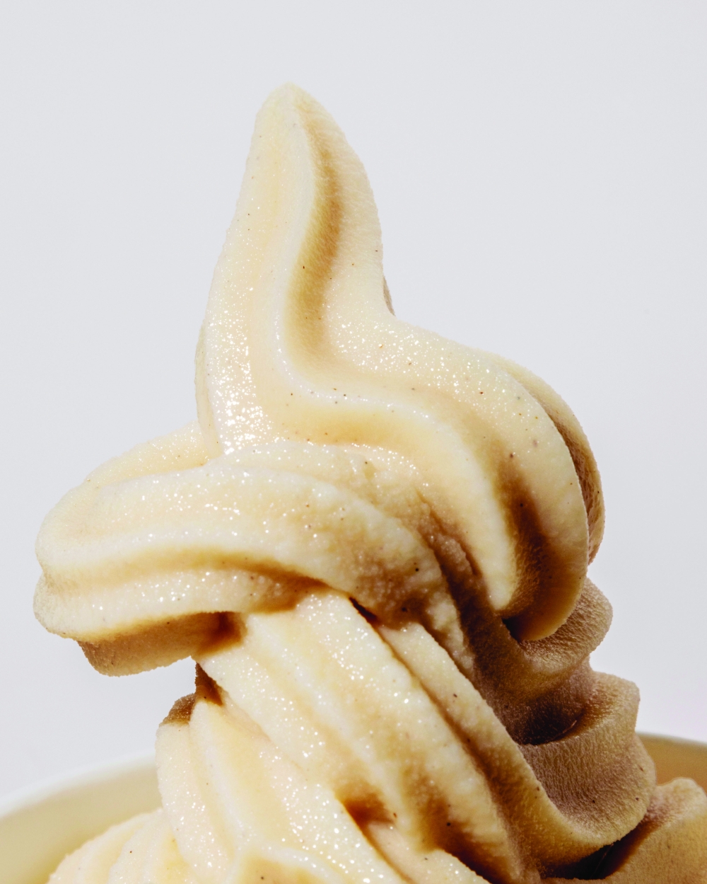 Frozen yoghurt typically has fewer calories and less saturated fat than ice cream