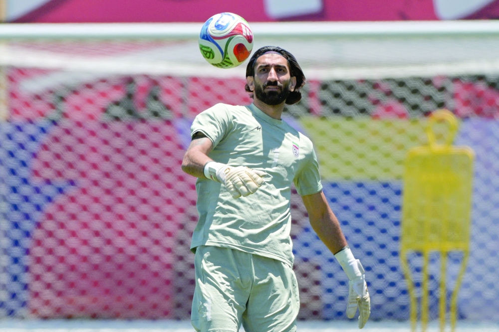 Iran's goalkeeper #01 Alireza Beiranvand takes part in a training. — AFP
