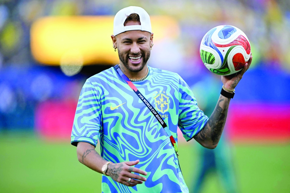 Brazil's forward #10 Neymar gestures during a warm up. — AFP
