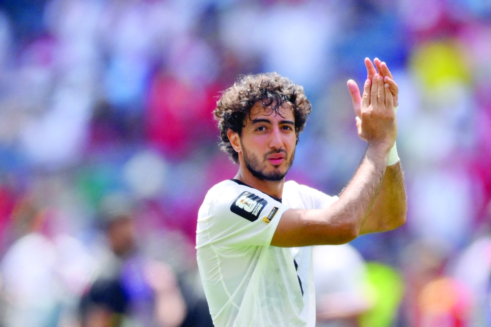  
Egypt's Mohamed Hany reacts after the match. — Reuters