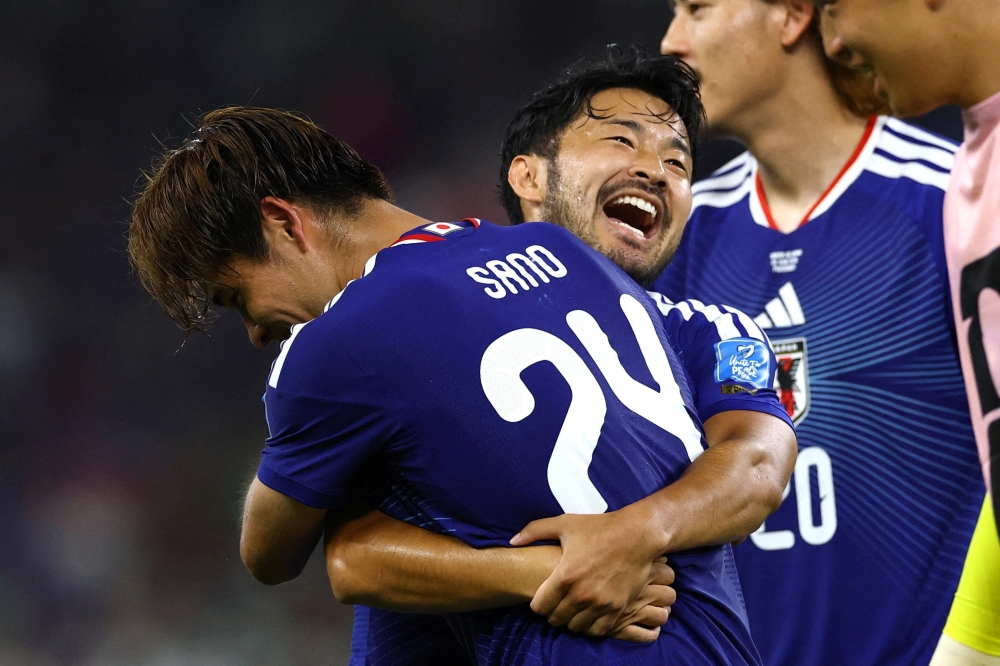 
Japan's Yukinari Sugawara celebrates their fourth goal. — Reuters