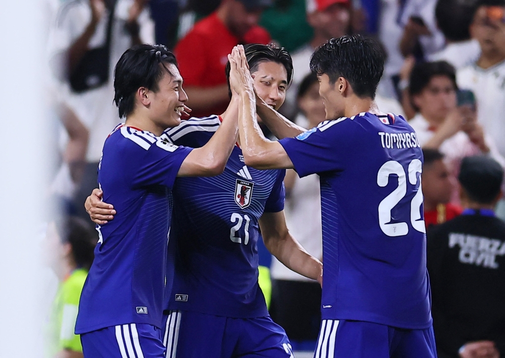  
Japan's Ayase Ueda celebrates scoring first goal. — Reuters