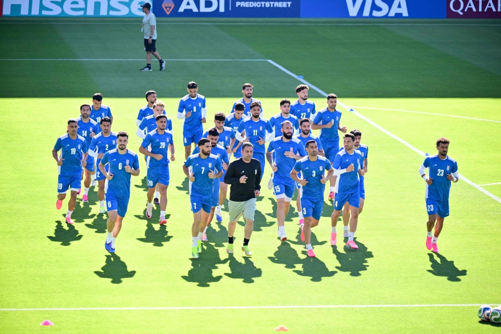 Iran's players take part in training. — AFP